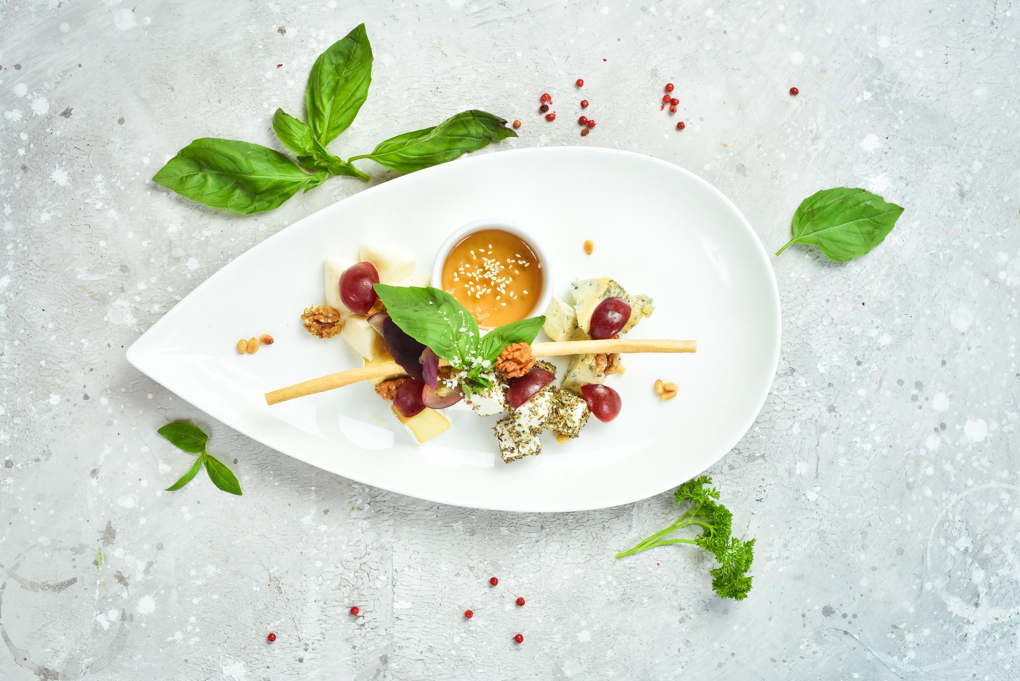 Plated seasonal starter with herbs